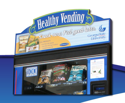 Custom graphic machine caps for the food-service and vending industries